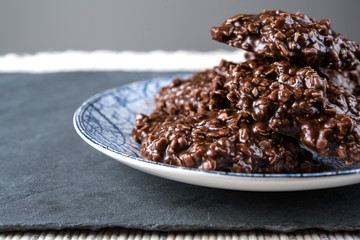 Organic peanut butter & Chocolate No Bake Cookies on a stone cutting board