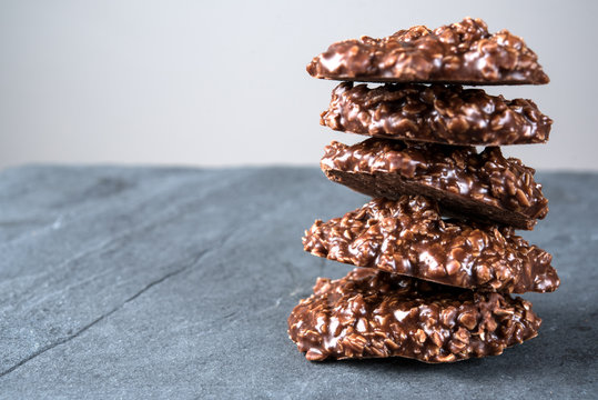 Organic Peanut Butter & Chocolate No Bake Cookies On A Stone Cutting Board