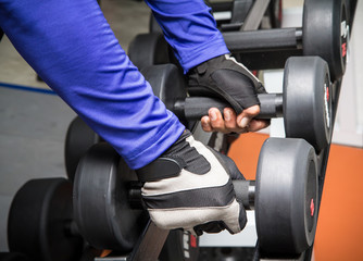 Obraz na płótnie Canvas Fitness club weight training equipment gym modern interior