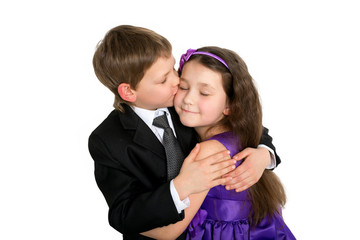 Kids love concept. Boy kissing girl.