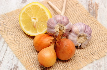 Fresh onions, garlic and lemon, healthy nutrition and strengthening immunity