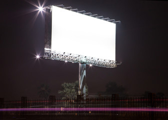 Blank billboard at night - can advertisement for display or montage your products or your business.