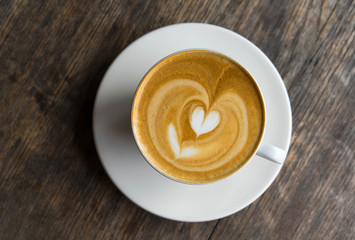 Cup of hot coffee put on the table