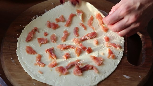 Cooking Mexican tortilla with salmon