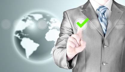business man touching, pressing modern button with green ticking Check Box.