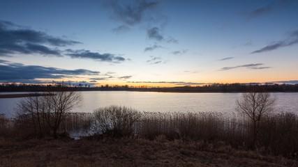 Beautiful sunset over calm lake
