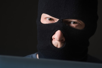 Hacker in a mask
