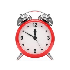 red alarm clock on white