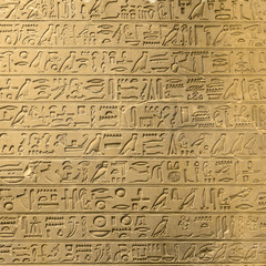 Fototapeta na wymiar Ancient egyptian hieroglyphs on the wall