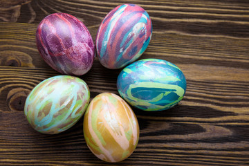 Obraz premium Easter eggs on wooden background