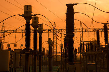 Silhouette of high voltage power plant and transformation statio