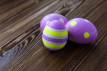 Easter eggs on wooden background