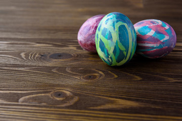 Easter eggs on wooden background