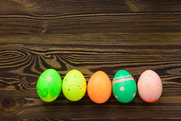 Easter eggs on wooden background