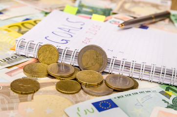 New years resolutions save money. euro background