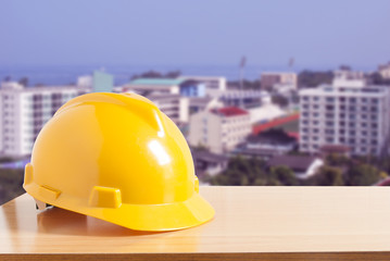 Safety helmet with construction site background