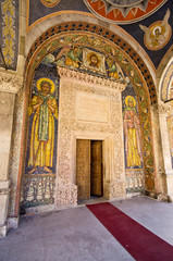 Fototapeta na wymiar Decorated door of church in Bucharest, Romania