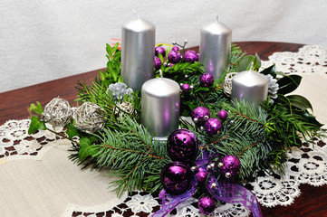 Obraz na płótnie Canvas Advent wreath decorated with candles
