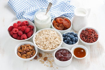 oat flakes and various delicious ingredients for breakfast 