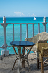 Table and chairs set for ocean view