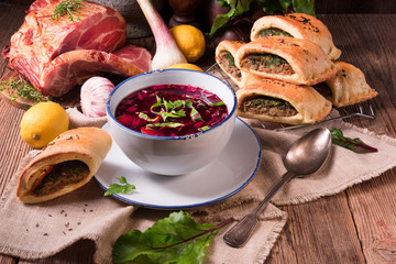  beet green soup with pastries - obrazy, fototapety, plakaty