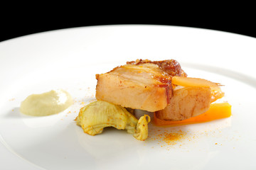 Plated freshly grilled pork bellies with vegetable