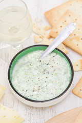 sauce on dish with cookies and bread