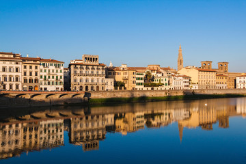 View on the old Florence houses from the Ponte Vecchio over Arno river in Florence, Tuscany, Italy
