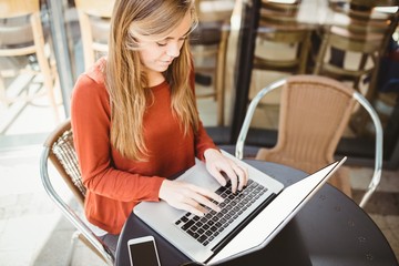 Woman using her laptop