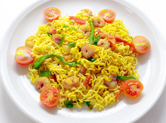 Dish of noodles with prawns and vegetables