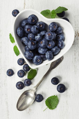 Healthy breakfast of muesli, berries with yogurt and seeds