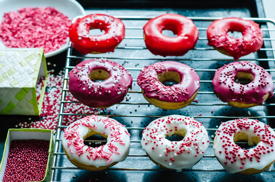 Homemade colorful donuts with icing glaze