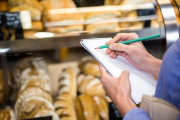 Woman checking her shopping list