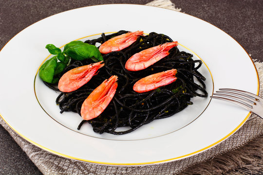 Black Spaghetti with Cuttlefish Ink, Prawns and Basil. Mediterra