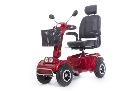 Fototapeta generic mobility scooter for disabled or elderly people against