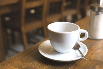 Cup of coffee and sugar-bowl