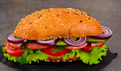 Healthy eating: Fresh sandwich with lettuce, tomato and onion.