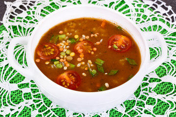 Spicy soup with curry, chili, cereals, rice and vegetables.