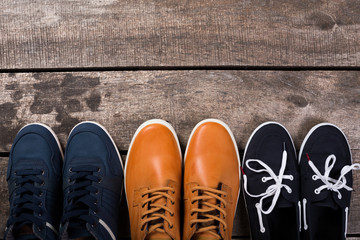 Men's shoes on wooden background