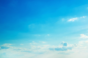 white fluffy clouds in the blue sky