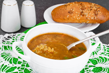 Healthy and diet food: soup with rice and vegetables, curry, chi