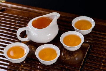 Chinese tea service cup of hot green tea