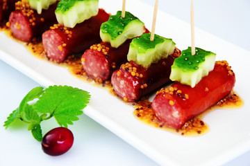 Cocktail Sausage and Cucumber on Plate