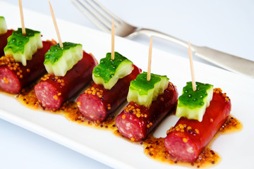 Cocktail Sausage and Cucumber on Plate
