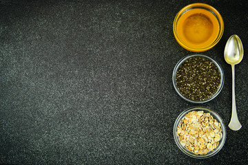Chia Seeds, Oatmeal, Honey in Glass Bowl