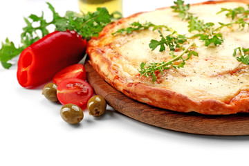 Pizza full of cheese on wooden board with vegetables isolated on white background, close up