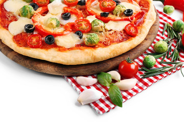 Delicious pizza with cheese and vegetables on red checkered napkin closeup