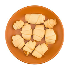 The plate of hand made cookies with jam, isolated on white backg