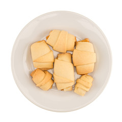 The plate of hand made cookies with jam, isolated on white backg