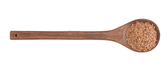 Flax seeds in wooden spoon, clipping path included